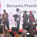 Di Tengah Guyuran Hujan, Presiden Jokowi Temui Petani Lampung