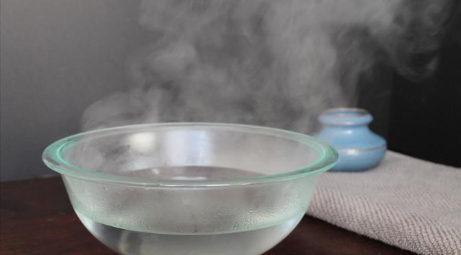 Uap panas air untuk flu