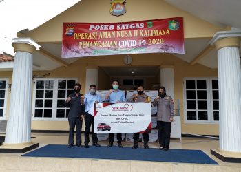 DFSK Sumbangkan Masker dan Thermogun ke Polda Banten dan Polres Serang