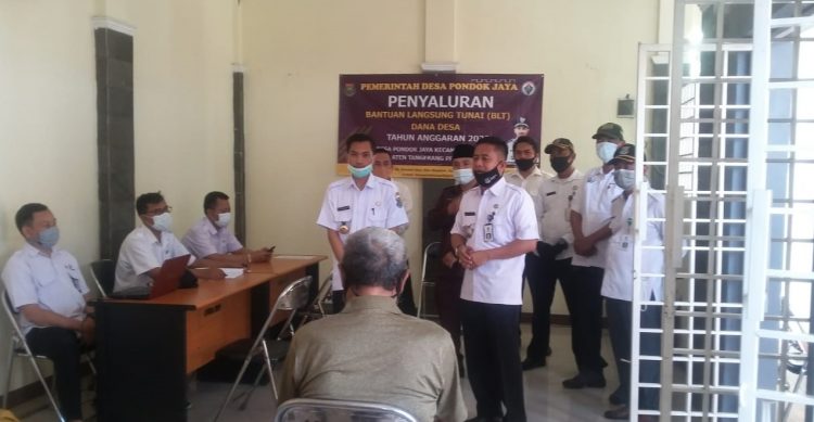 Penyaluran bansos covid-19 dana desa. (IST)